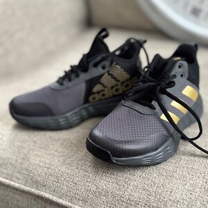 Adidas Black and Gold Sneakers